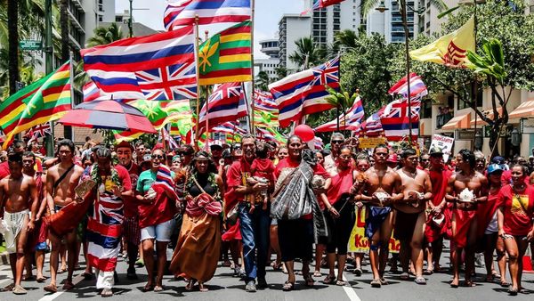 Hawaiian community members marching for the protection and sovereingty of the ʻāina.